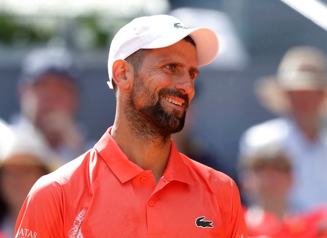 Tennis - Madrid Open - Park Manzanares, Madrid, Spain - April 26, 2025 Serbia's Novak Djokovic reacts during his round of 64 match against Italy's Matteo Arnaldi REUTERS/Juan Medina/File Photo