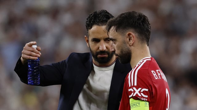 Manchester United manager Ruben Amorim with Manchester United's Bruno Fernandes after the match.