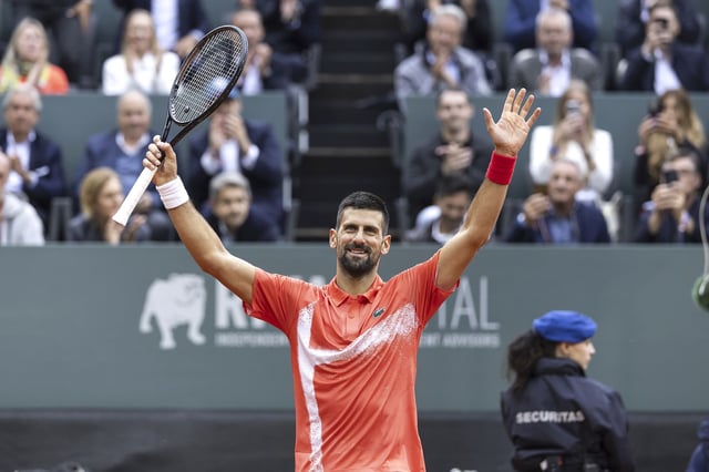 Serbia's Novak Djokovic celebrates after winning a game against Hungary's Marton Fucsovics, during the round of 16 match at the ATP 250 Geneva Open Tennis Tournament, in Geneva, Switzerland, Wednesday, May 21, 2025 (Cyril Zingaro/Keystone via AP)