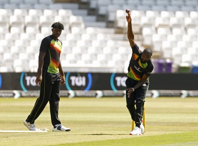 Cricket - International Test Match Series - Zimbabwe Practice Session - Trent Bridge, Nottingham, Britain - May 21, 2025 Zimbabwe's Tanaka Chivanga during practice as Richard Ngarava looks on Action Images via Reuters/Jason Cairnduff