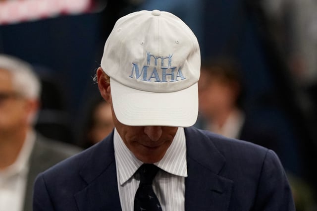 An attendee wears a Make America Healthy Again (MAHA) hat during a press conference announcing of the U.S. Food and Drug Administration's (FDA) intent to phase out the use of petroleum-based synthetic dyes in the nation's food supply, at the Department of Health and Human Services in Washington, D.C., U.S., April 22, 2025. REUTERS/Elizabeth Frantz/File Photo