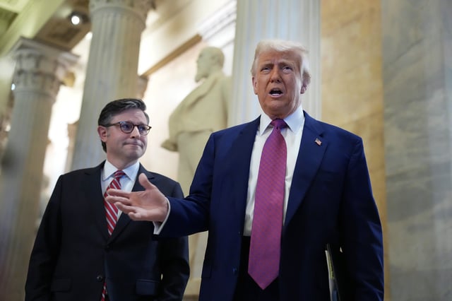 President Donald Trump arrives with Speaker of the House Mike Johnson (R-LA) for a House Republican meeting at the U.S. Capitol on May 20, 2025, in Washington, D.C.