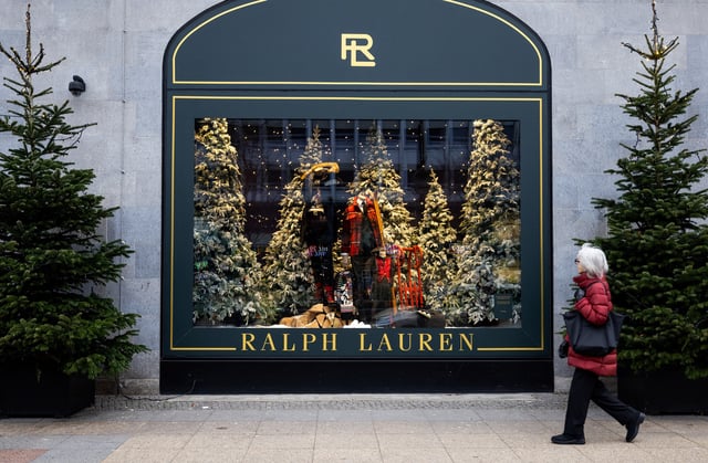 A person looks at a shop window branded by Ralph Lauren at the department store Kaufhaus des Westens "KaDeWe" during Christmas season in Berlin, Germany, December 18, 2023.  REUTERS/Lisi Niesner/File Photo
