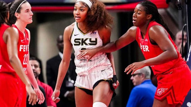 Chicago Sky forward Angel Reese (5) reacts to a flagrant foul from Indiana Fever guard Caitlin Clark (22).
