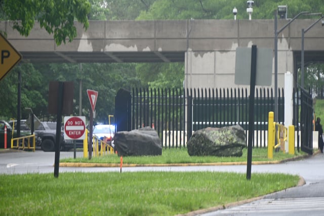A view of the gates to the CIA property after a person shot outside Central Intelligence Agency Headquarters by security guards in McLean, Virginia, United States on Thursday, May 22, 2025.