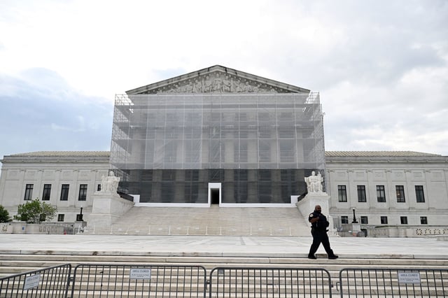 A police officer is seen outside the Supreme Court of the United States is seen on Thursday May 15, in Washington, DC.