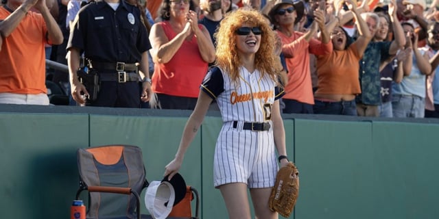 Natasha Lyonne as Charlie Cale in a baseball stadium in Poker Face