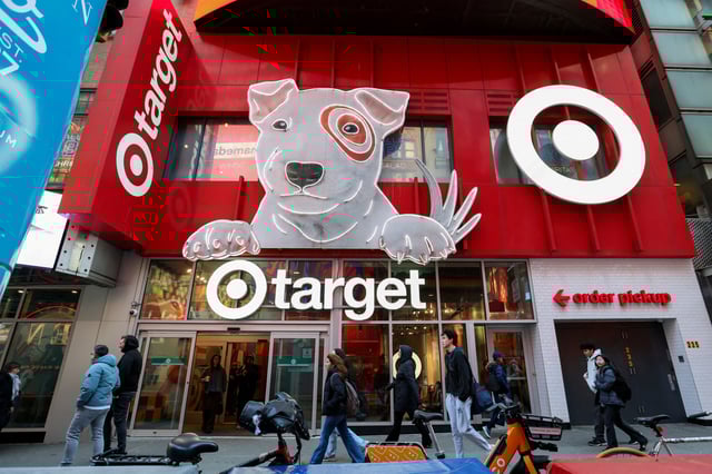 People walk by a Target store in midtown Manhattan in New York City, U.S., March 21, 2025. REUTERS/Kylie Cooper/File Photo