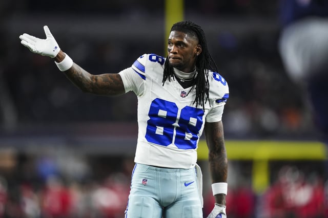 CeeDee Lamb #88 of the Dallas Cowboys warms up prior to an NFL football game against the Tampa Bay Buccaneers at AT&amp;T Stadium on December 22, 2024 in Arlington, Texas.