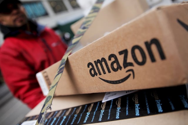 Amazon boxes are seen stacked for delivery in New York City.