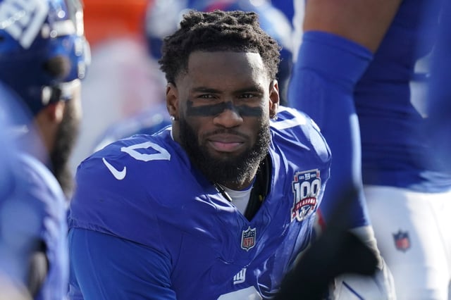 New York Giants linebacker Brian Burns (0) on the bench of an NFL football game against the New Orlean Saints, Sunday, Nov. 17, 2024 in East Rutherford, N.J. The Saints defeated the Giants 14-11. (AP Photo/Vera Nieuwenhuis)