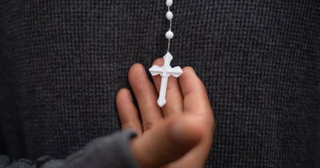 A cross from a rosary, on Nov. 26, 2019.