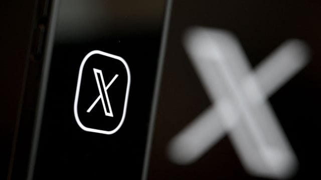 This illustration photograph shows the logo of social network X (formerly Twitter) displayed on a smartphone.