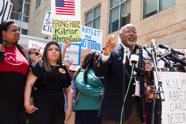 Wife of Kilmar Abrego Garcia, Jennifer Vasquez Sura, second from left, with Rep. Glenn Ivey, D-Md., right, joins a rally outside the U.S. Courthouse in Greenbelt, Md., where a federal judge in Maryland will hear arguments Friday, May 16, 2025.  (AP Photo/Manuel Balce Ceneta)