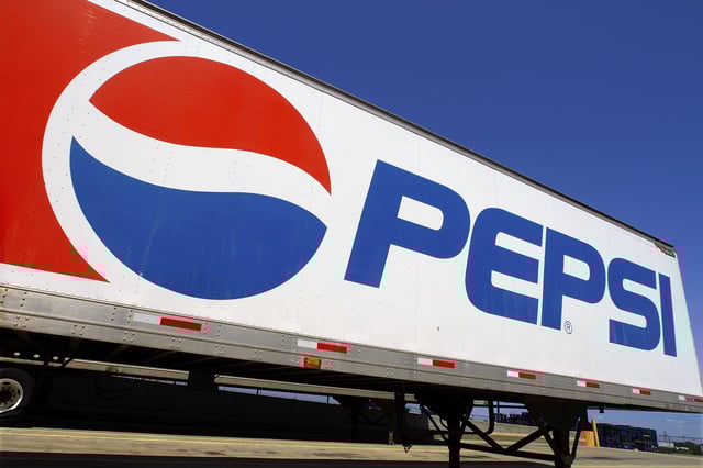 FILE - In this photo taken May 16, 2011, the Pepsi logo is seen on a delivery truck at Walmart in Springfield, Ill. (AP Photo/Seth Perlman, File)