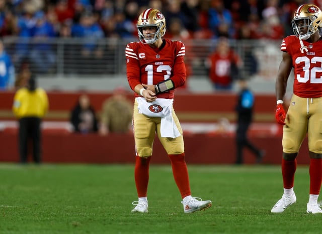San Francisco 49ers starting quarterback Brock Purdy (13) holds his arm after being sacked against the Detroit Lions late in the fourth quarter at Levi’s Stadium in Santa Clara, Calif., on Monday, Dec. 30, 2024. He would leave the game and not return. (Nhat V. Meyer/Bay Area News Group)