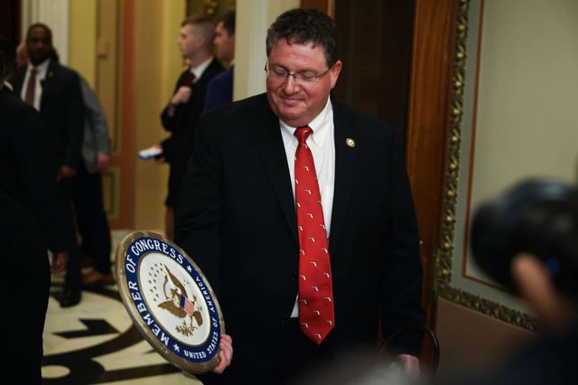 Rep. Randy Fine holds a seal of the House that he bought 30 years ago after he is sworn in by U.S. Speaker of the House Rep. Mike Johnson at the U.S. Capitol on April 2, 2025, in Washington, D.C.