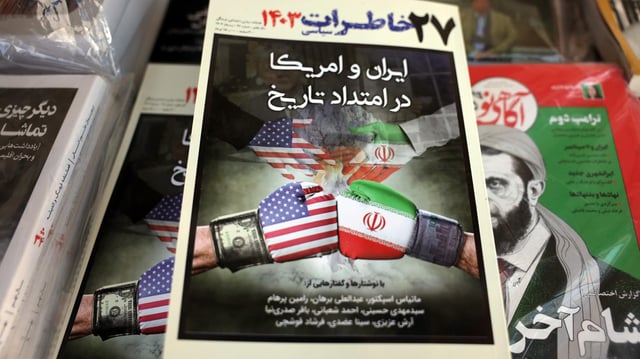 Ein Zeitschrift im Iran zeigt ein Symbolbild zu den US-iranischen Atomgesprächen.