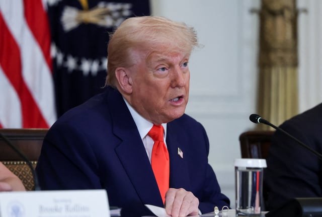 U.S. President Donald Trump attends a Make America Healthy Again (MAHA) Commission event, in the East Room of the White House in Washington, D.C., U.S., May 22, 2025. REUTERS/Evelyn Hockstein/File Photo