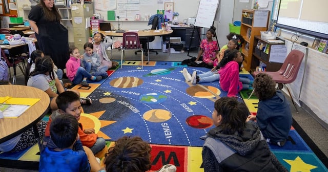 After out loud reading time, Dana Altamirano discusses the book they just read as a group with her fourth grade students at West Avenue Elementary in Waco on April 5, 2024.