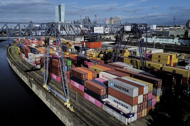 Containers are pictured at a cargo terminal in Frankfurt, Germany, Thursday, May 22, 2025. (AP Photo/Michael Probst)
