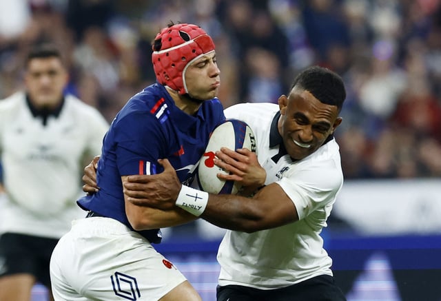Rugby Union - Autumn Internationals - France v New Zealand - Stade de France, Saint-Denis, France - November 16, 2024 France's Louis Bielle-Biarrey in action with New Zealand's Sevu Reece REUTERS/Stephanie Lecocq/File Photo