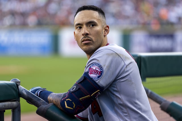 Jul 23, 2022; Detroit, Michigan, USA; Minnesota Twins shortstop Carlos Correa (4) looks into the crowd from the dugout during the seventh inning in a game against the Detroit Tigers at Comerica Park. Mandatory Credit: Raj Mehta-USA TODAY Sports/File Photo