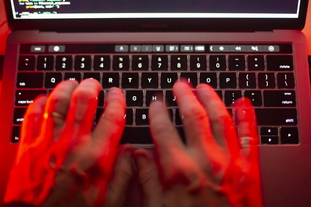 A man uses a computer keyboard in Toronto in this Sunday, Oct. 9, 2023 photo illustration. The First Nations Health Authority in B.C. is investigating after being hit by a cybersecurity attack.THE CANADIAN PRESS/Graeme Roy