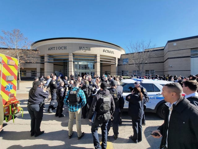 Emergency personnel gather outside Antioch High School after a shooting incident on Jan. 22 in Nashville, Tenn. (METRO NASHVILLE POLICE VIA AP)