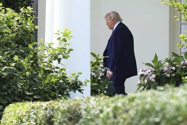 President Donald Trump departs the White House, Friday, May 23, 2025, in Washington. (AP Photo/Jacquelyn Martin)