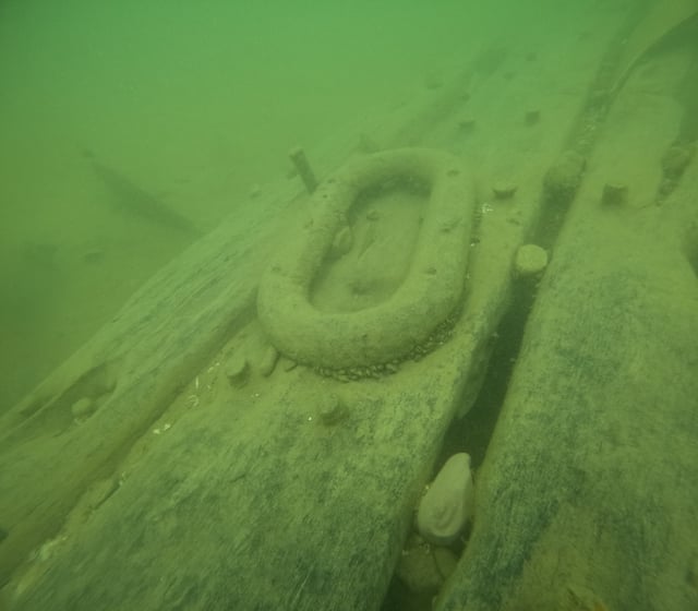 The wreckage is submerged under nine feet of water in Lake Michigan.