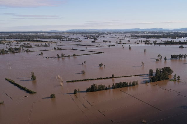 A drone view shows a flooded area near the Hunter River in Heatherbrae, Australia, May 24, 2025. REUTERS/Hollie Adams