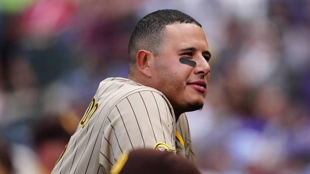 May 11, 2025; Denver, Colorado, USA; San Diego Padres third baseman Manny Machado (13) during the fifth inning against the Colorado Rockies at Coors Field. Mandatory Credit: Ron Chenoy-Imagn Images