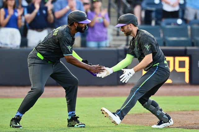 The Tampa Bay Rays&#39; Brandon Lowe, right, celebrates with Junior Caminero after hitting a two-run home run in the third inning against Toronto at Tampa&#39;s George M. Steinbrenner Field on Friday night. (Julio Aguilar/Getty Images/TNS)