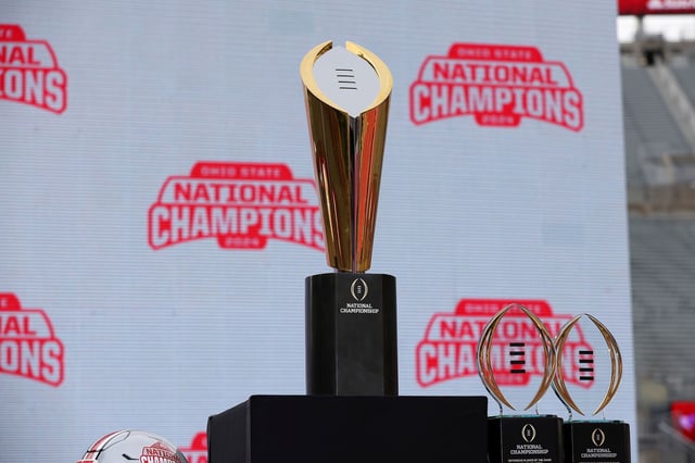 The College Football Playoff National Championship Trophy on display before the Ohio State Buckeyes National Championship celebration at Ohio Stadium in Columbus, Ohio, on January 26, 2025.