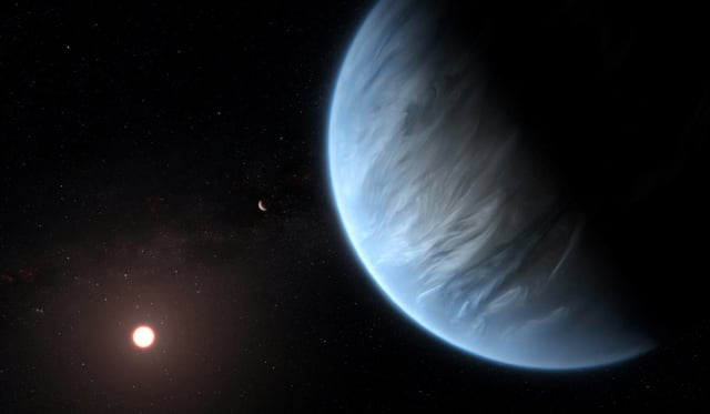 Illustration artistique diffusée le 11 septembre 2019 par l'ESA/Hubble de l'exoplanète K2-18b, qui abriterait à la fois de l'eau et des températures susceptibles de soutenir la vie