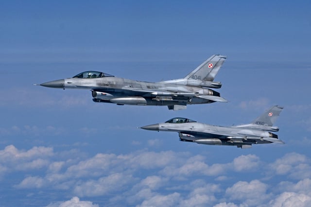 This illustrative image from July 4, 2023 shows Polish Air Force F-16 jetfighters in a NATO exercise.