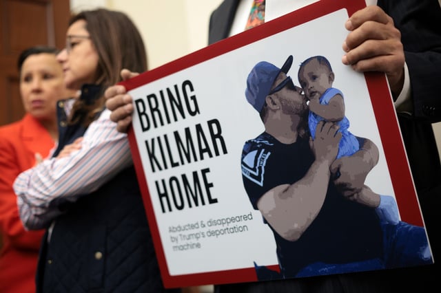 Stock photograph showing a member of the Congressional Hispanic Caucus holding a picture of Kilmar Abrego Garcia during a news conference to discuss Abrego Garcia&#39;s arrest and deportation at Cannon House Office Building on April 9, 2025 in Washington, DC.