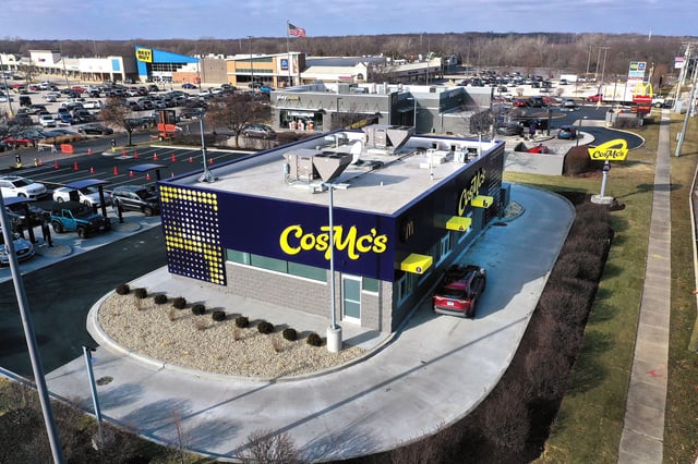 BOLINGBROOK, ILLINOIS - DECEMBER 11: An aerial view shows a CosMc's restaurant, a concept recently launched by McDonald’s on December 11, 2023 in Bolingbrook, Illinois. Lines to order food and beverages at the drive-thru-only restaurant, which opened to the public late last week, have been as long as 6 hours. (Photo by Scott Olson/Getty Images)