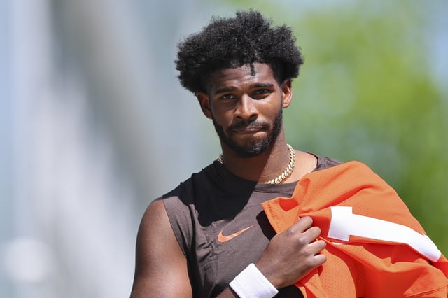 Shedeur Sanders #12 of the Cleveland Browns walks off the field after rookie minicamp at CrossCountry Mortgage Campus on May 09, 2025 in Berea, Ohio.