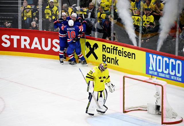 Ice Hockey - IIHF World Championships - Semi Finals - Sweden v United States - Avicii Arena, Johanneshov, Sweden - May 24, 2025 Jackson LaCombe of the U.S. celebrates scoring their fifth goal with teammates as Sweden's Samuel Ersson looks dejected Pontus Lundahl/TT News Agency via REUTERS     ATTENTION EDITORS - THIS IMAGE WAS PROVIDED BY A THIRD PARTY. SWEDEN OUT. NO COMMERCIAL OR EDITORIAL SALES IN SWEDEN.