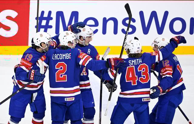 Ice Hockey - IIHF World Championships - Semi Finals - Sweden v United States - Avicii Arena, Johanneshov, Sweden - May 24, 2025 Cutter Gauthier of the U.S. celebrates scoring their second goal with teammates Pontus Lundahl/TT News Agency via REUTERS     ATTENTION EDITORS - THIS IMAGE WAS PROVIDED BY A THIRD PARTY. SWEDEN OUT. NO COMMERCIAL OR EDITORIAL SALES IN SWEDEN.
