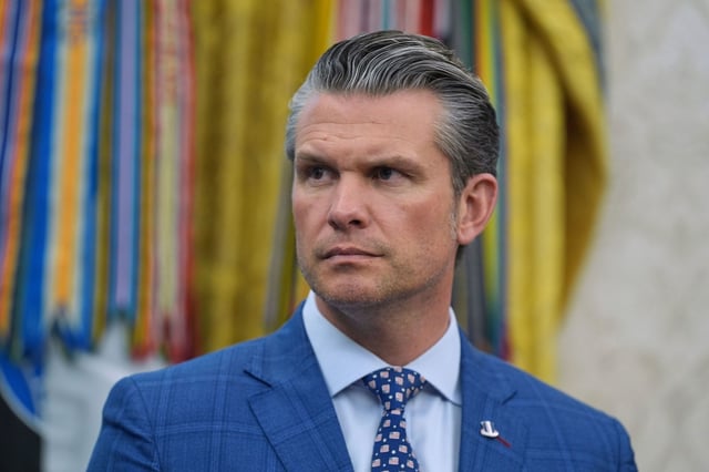Defense Secretary Pete Hegseth listens during an event with President Donald Trump to sign executive orders regarding nuclear energy in the Oval Office of the White House, Friday, May 23, 2025, in Washington. (AP Photo/Evan Vucci)