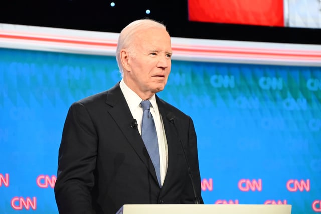 Joe Biden and Donald Trump participate in the presidential debate at CNN studios in Atlanta on June 27, 2024. (Photo by Kyle Mazza/Anadolu/ Getty Images)
