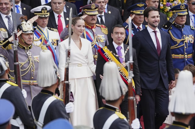 Ecuador's President Daniel Noboa walks out of the National Assembly with his wife, Lavinia Valbonesi, and National Assembly President Niels Olsen, right, after his swearing-in ceremony for a second term, in Quito, Ecuador, Saturday, May 24, 2025. (AP Photo/Dolores Ochoa)