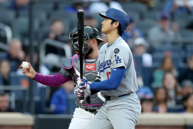 NEW YORK, NEW YORK - MAY 24:  Shohei Ohtani #17 of the Los Angeles Dodgers reacts after striking out in the first inning as Luis Torrens #13 of the New York Mets defends at Citi Field on May 24, 2025 in the Flushing neighborhood of the Queens borough of New York City. (Photo by Elsa/Getty Images)