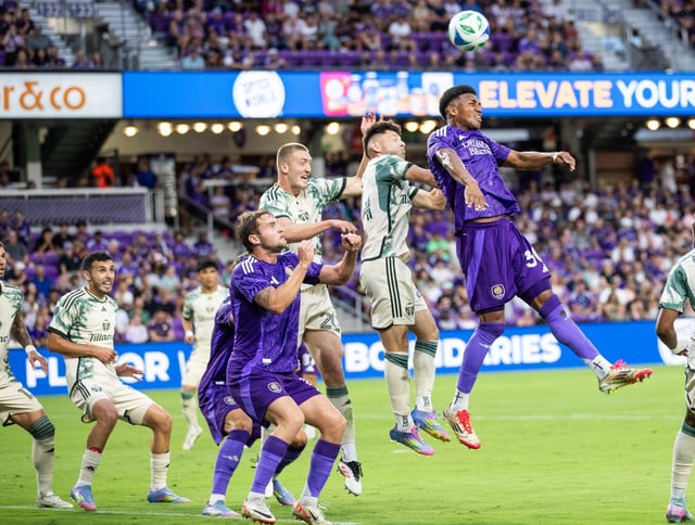 Orlando City defender Alex Freeman (30) leaps into the air on a corner kick during the match against Portland Timbers at the Inter &amp; Co Stadium in Orlando on  Saturday, May 24, 2025. (Willie J. Allen Jr./Orlando Sentinel)