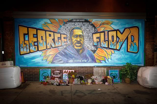 A mural honoring George Floyd with the names of victims of police brutality was painted in Minneapolis at the site of his arrest.