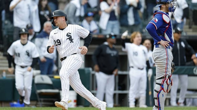 May 24, 2025; Chicago, Illinois, USA; Chicago White Sox catcher Matt Thaiss (29) scores against the Texas Rangers during the sixth inning at Rate Field. Mandatory Credit: Kamil Krzaczynski-Imagn Images