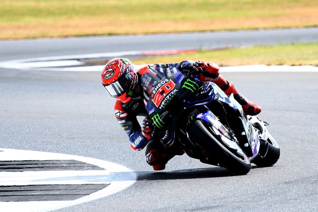 MotoGP - British Grand Prix - Silverstone Circuit, Silverstone, Britain - May 25, 2025 Monster Energy Yamaha MotoGP's Fabio Quartararo in action with riders during warm up ahead of the race Action Images via Reuters/Andrew Boyers